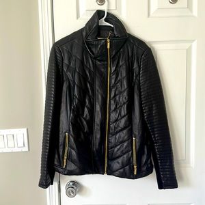 Leather coat with gold zippers
